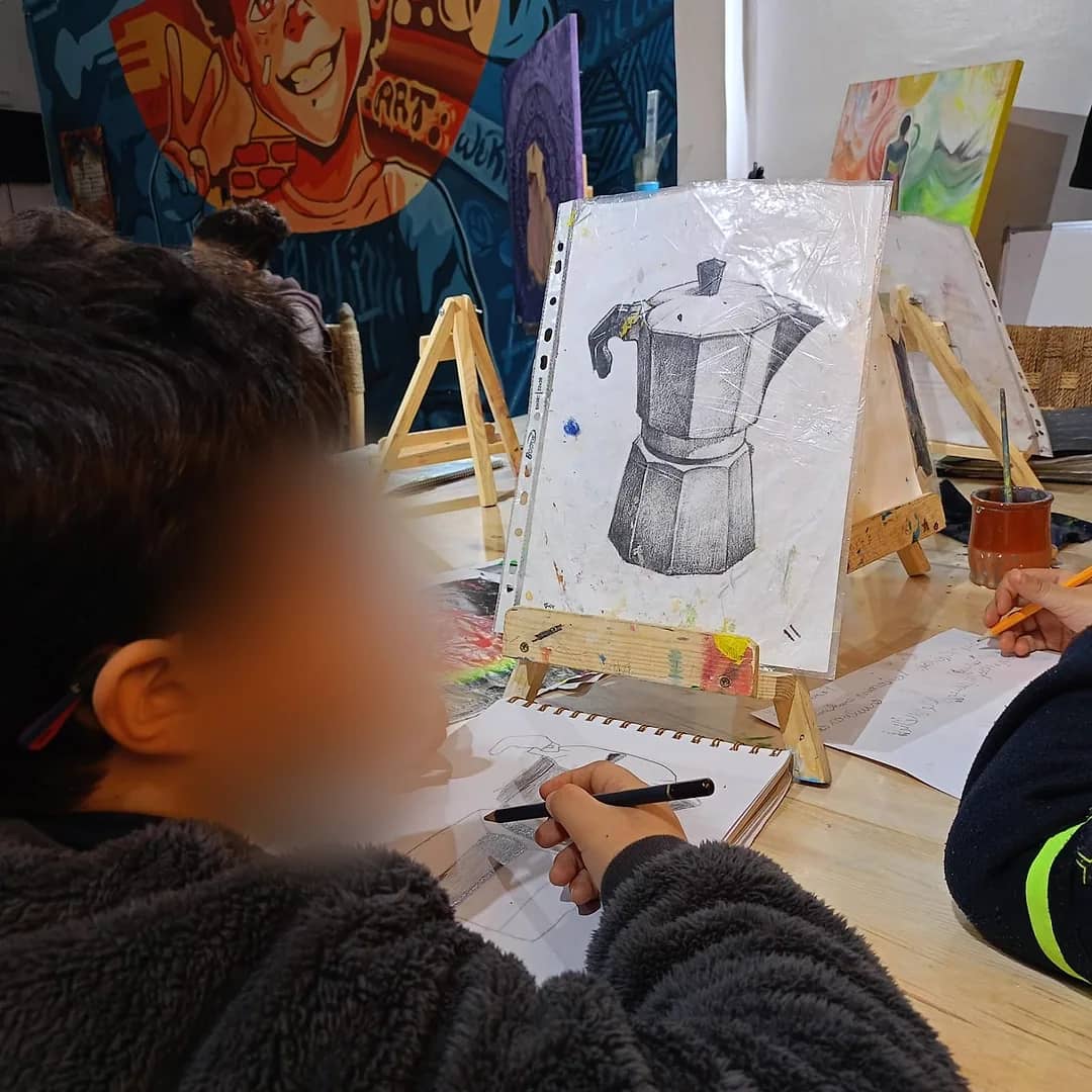A handmade fabric pouch finished in a DIY sewing workshop – creative arts plastiques workshop