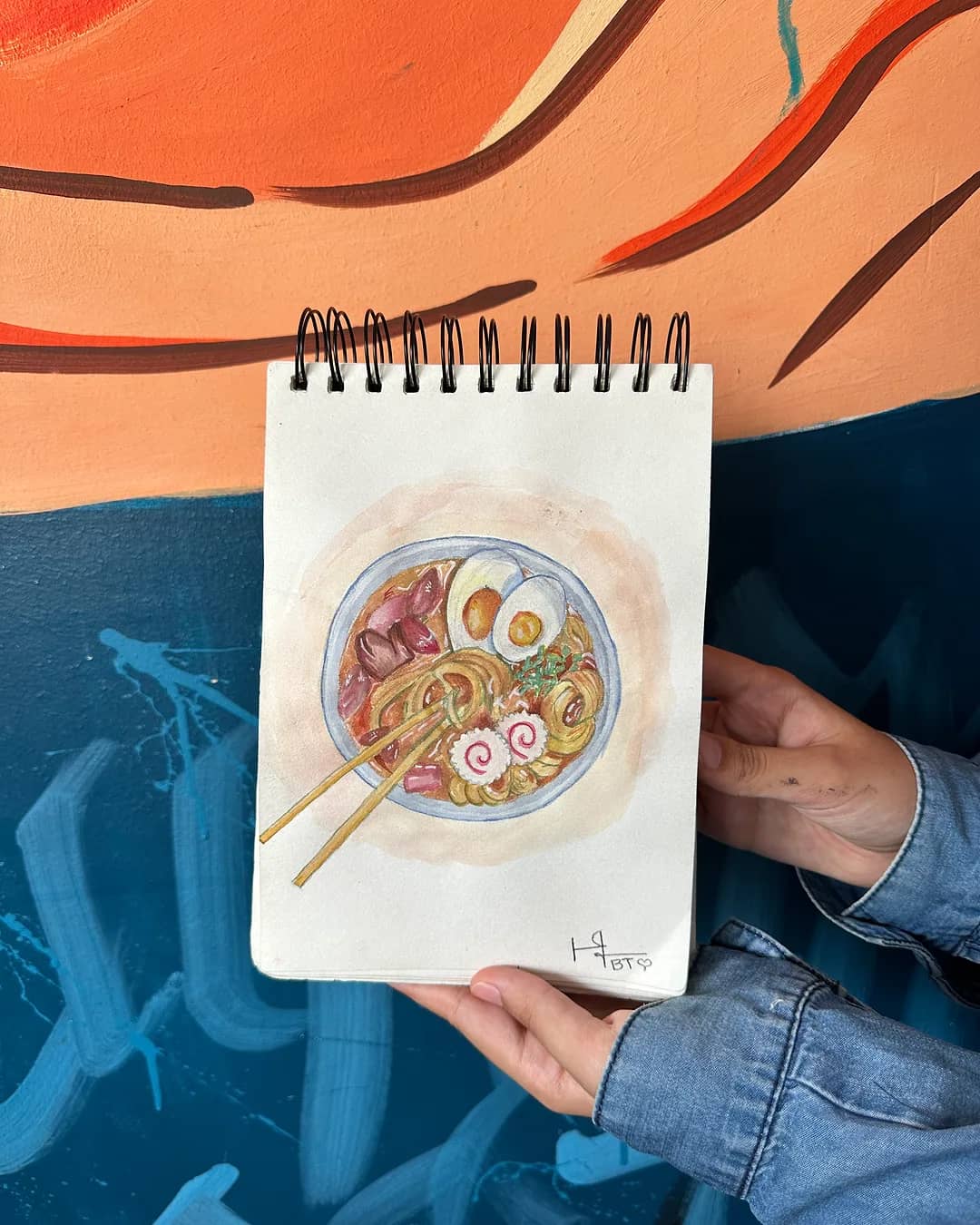 A watercolour sketch of a noodle bowl in an open notebook – drawing and watercolour class, arts plastiques in Casablanca & Fès