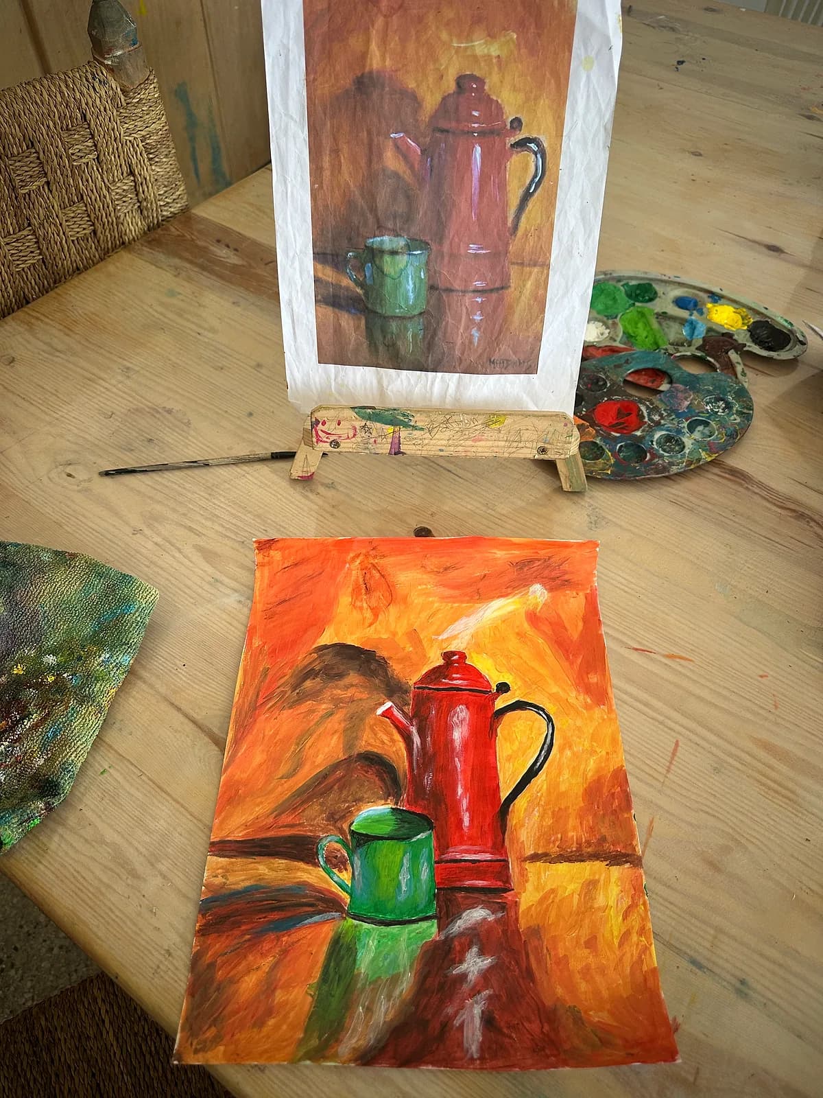 Still-life painting of a red coffee pot and green mug